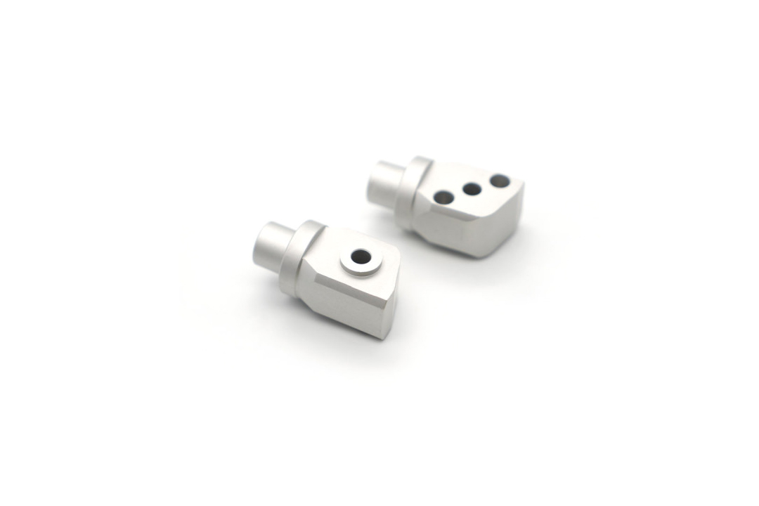 Barracuda footrest adapter set rear Kawasaki